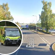 A man was taken to a hospital after a crash between a car and a motorcycle outside a Suffolk retail park.