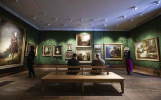 Visitors explore the display in the Gainsborough Gallery at the newly redeveloped Gainsborough's House in Sudbury