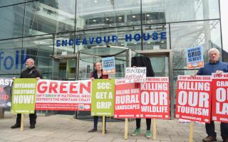 Protestors gathered outside Suffolk County Council's offices to protest against National Grid's plans