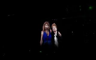 Taylor Swift performs on stage with surprise guest, Ed Sheeran