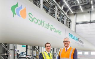 Charlie Jordan, CEO ScottishPower Renewables (in yellow hi-vis vest) with Darren Davidson, UK and Ireland Vice President for Siemens Energy and Siemens Gamesa (in orange hi-vis).