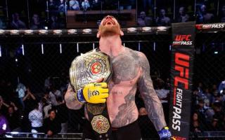 Colchester's James Webb celebrates winning the light heavyweight title at Cage Warriors 180